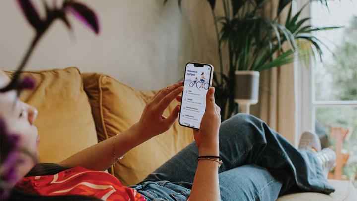 A person view the myCigna.com website on a smartphone