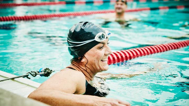 A person swims for exercise