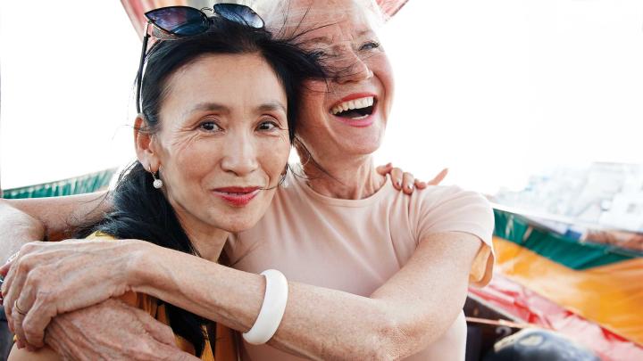 Two friends embrace