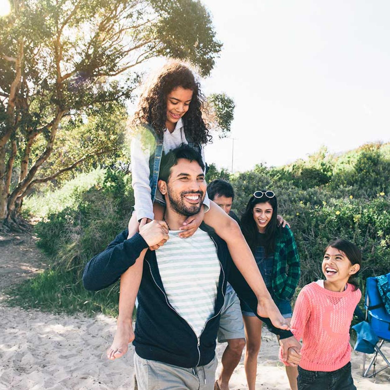 A family walks in the park together
