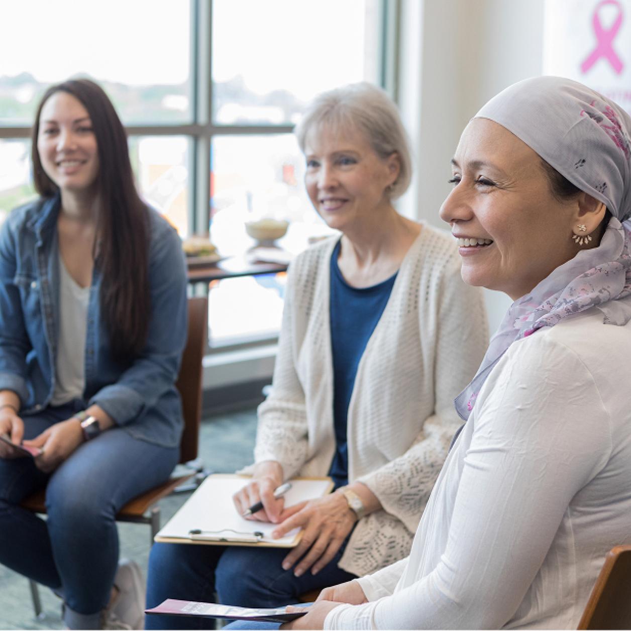 three women attend a breast cancer support group