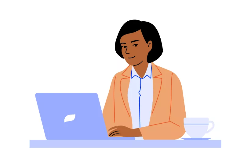 A broker works on her laptop