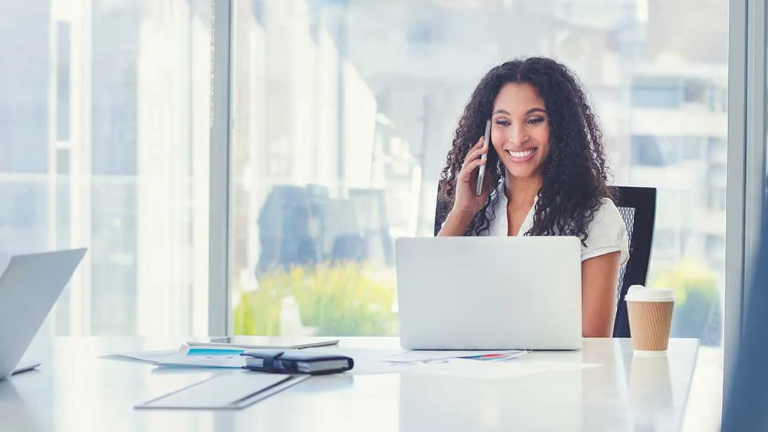 Person on phone at office
