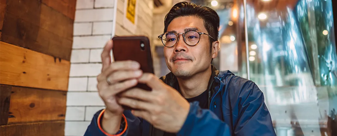 man using smartphone
