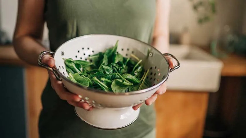 spinach in a colander