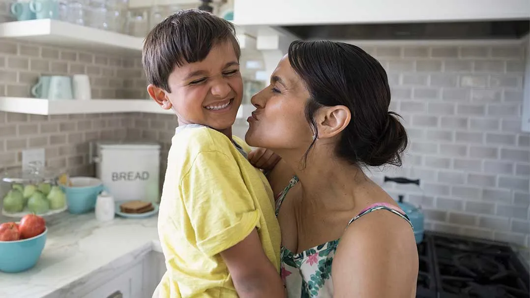 A mother and child play