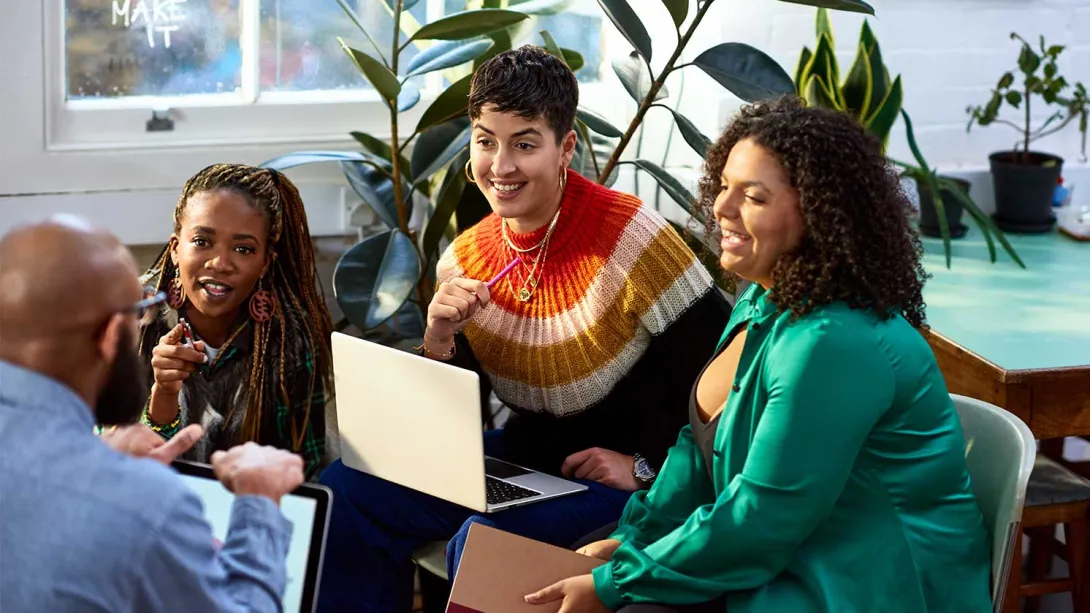 four people of color have a discussion