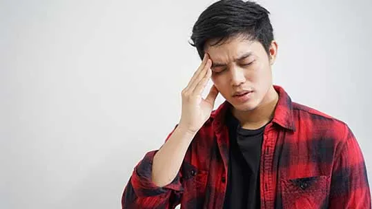 A person with a headache