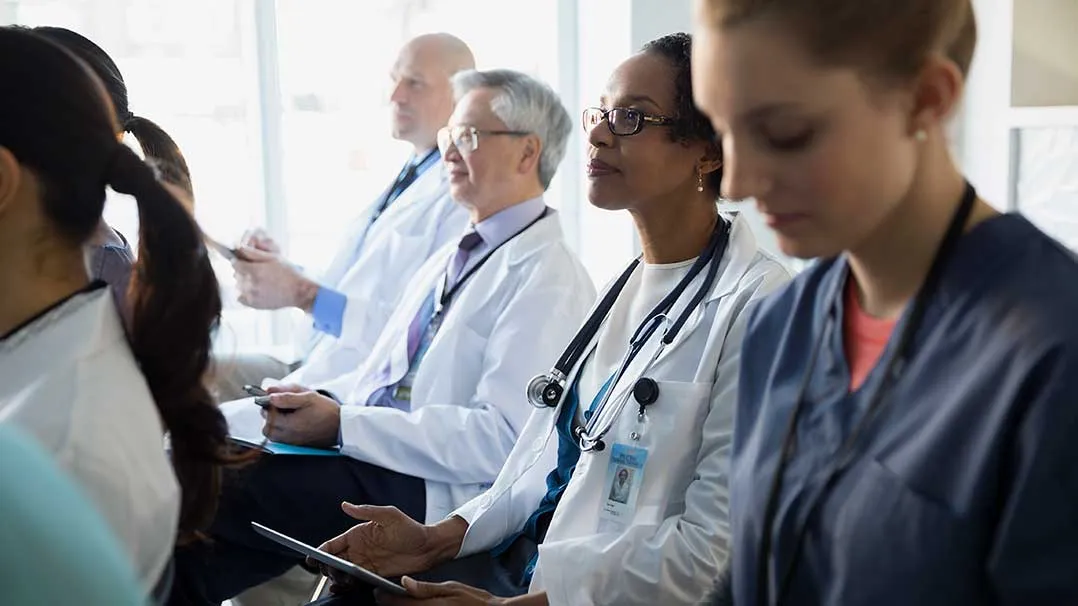 medical professionals attend a conference