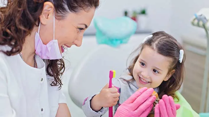 A child with a dentist